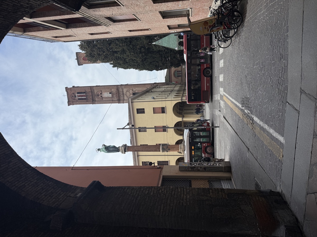 Piazza with column and bell tower