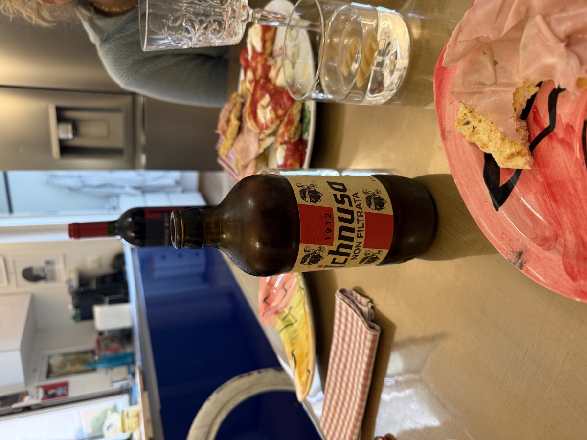 Dinner spread with Ichnusa beer
